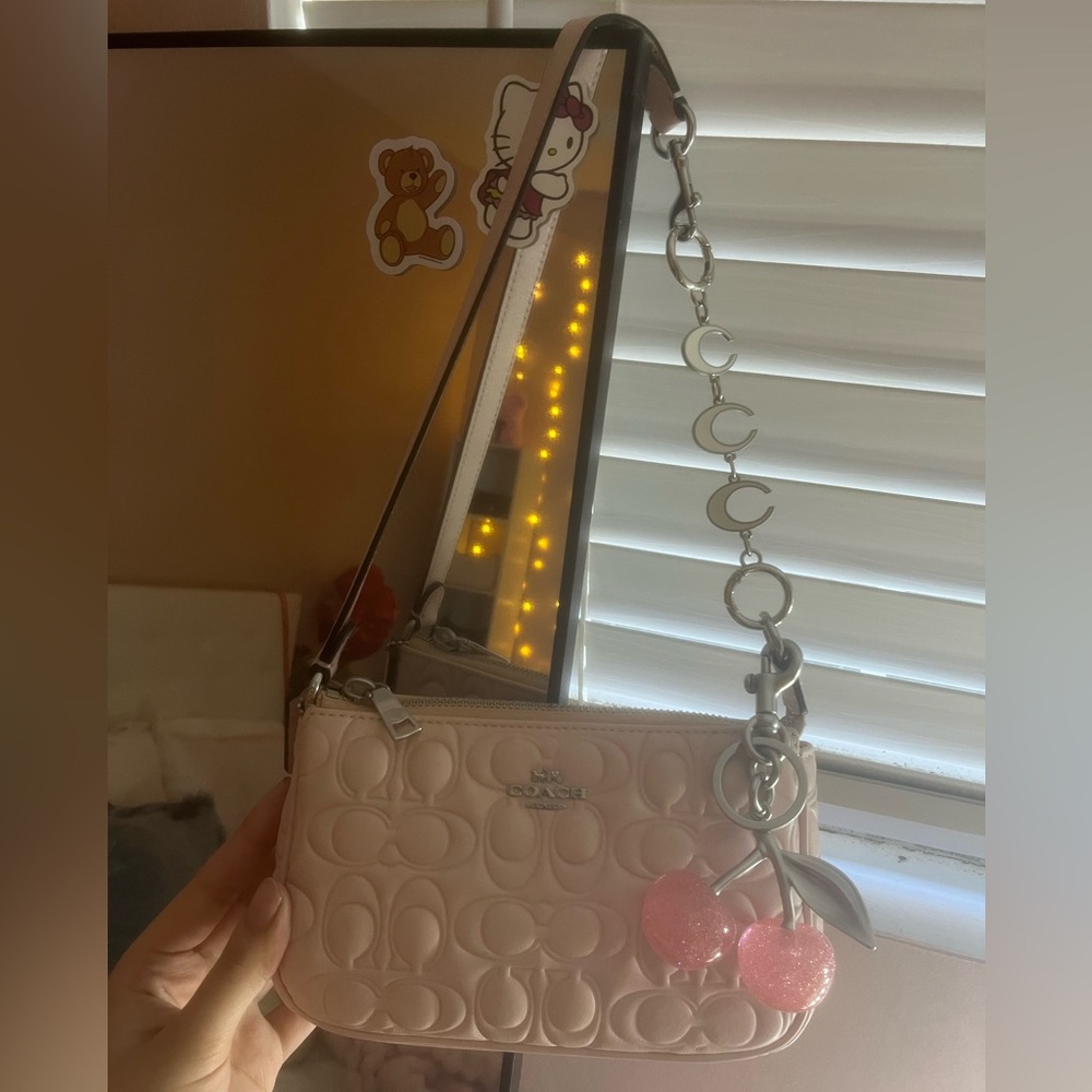 Coach Light Pink Crossbody Bag with Logo Charm